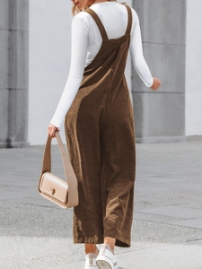 Women's dark brown corduroy wide leg overalls with adjustable straps and casual retro style