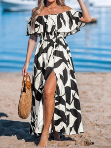 Off-shoulder maxi dress with leaf print, ruffle neckline and high side slit for summer beach