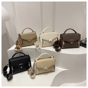 Detailed display of fashionable leather crossbody bags in five colors with wide straps