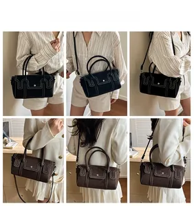 Détails du sac à bandoulière rétro avec coutures contrastées et sangle réglable