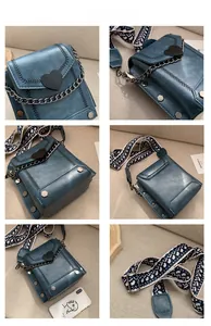 Detailansicht der blauen PU-Ledertasche mit Herzschnalle, Nieten und floralem Trageriemen