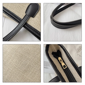 Macro shot of straw tote bag showing black leather straps and woven texture details