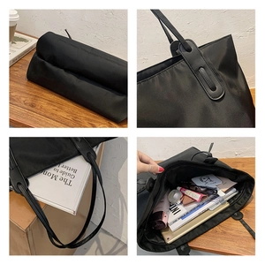 Detail view of large nylon tote bag with spacious interior for laptops and books