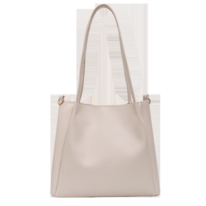 Minimalist beige tote bag in matte synthetic leather with gold metal loops and long straps