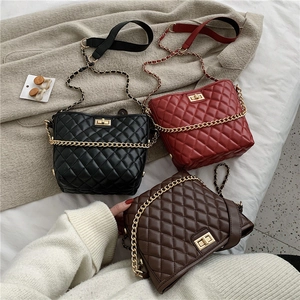 Quilted chain cross-body bags in black, burgundy and brown with gold twist lock hardware