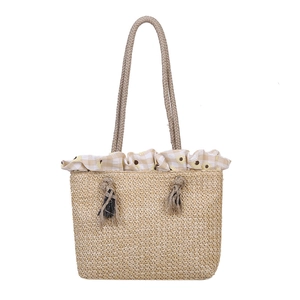 Summer woven straw tote bag with yellow floral pattern and knotted fringe details