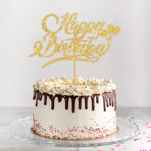 Glittery gold Happy Birthday cake topper with heart design for party decoration