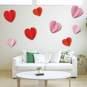 3D red and pink paper heart wall stickers in a modern living room interior setup