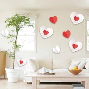 3D layered red and white heart wall decals decorating a modern living room wall