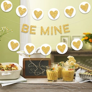 Golden glitter BE MINE banner set with ten heart pendants for wedding and party decor