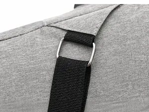 Detail of the durable silver metal ring connecting the nylon strap and grey fabric