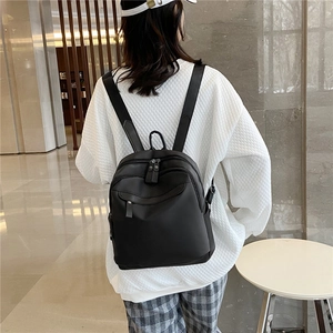 Sac à Dos Noir en Nylon Minimaliste pour Femme Sac d'École Voyage Décontracté Imperméable Léger Multi-poches Style Coréen Mode
