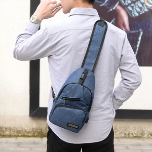 Men's blue casual chest bag with USB charging port and multi-zipper compartments