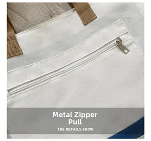 Detailed macro view of high-quality canvas fabric with silver metal zipper pull