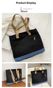 Detail view of large canvas tote bag with front zipper pocket and contrast blue base