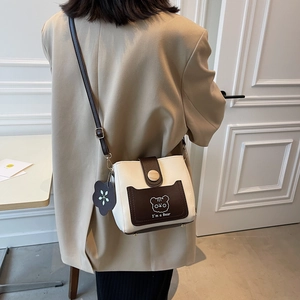 Japanese style color-block bucket bag with cute bear print and floral pendant charm