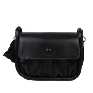Chic black cloud crossbody bag with pleated base and silk bow detail on white background