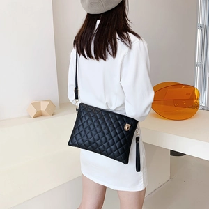 Classic black quilted PU leather crossbody square bag with gold hardware and shoulder strap