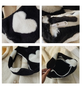 Détails du sac cabas en peluche à cœur avec texture fausse fourrure et espace intérieur