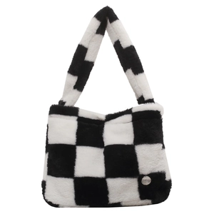 Fashionable black and white checkerboard plush tote bag with soft faux fur texture