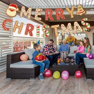 Close-up of Merry Christmas gingerbread style banner hung for festive family celebration