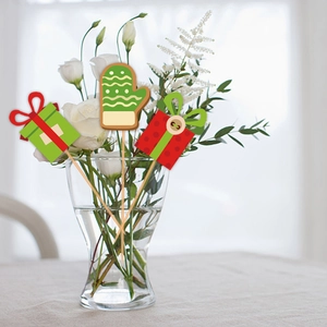 Christmas party photo props set with festive gift box and green glove vase decorations