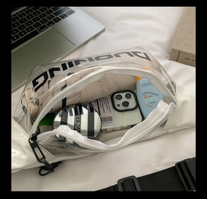 Detailed view of the transparent retro belt bag showing interior capacity and daily items