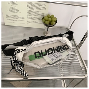 Detailed view of a transparent PVC chest bag with a stylish checkered rabbit charm