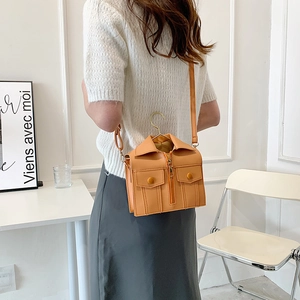 Vintage jacket-shaped mini crossbody bag in tan PU leather with metal hanger handle