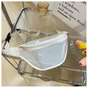 Detail of white transparent PVC waist bag with adjustable strap on a metal mesh cart