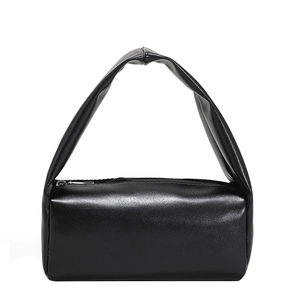 Minimalist black faux leather rectangular handbag with smooth glossy finish and top handle