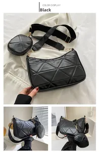 Detail der schwarzen Stepptasche mit Dreiecksnaht und kleinem rundem Münzbeutel