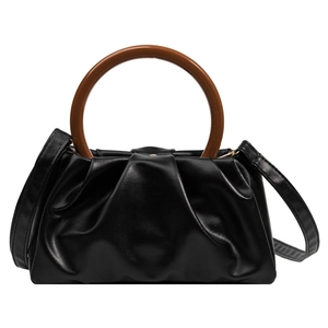 Fashionable black cloud pleat handbag with a stylish brown circular resin handle