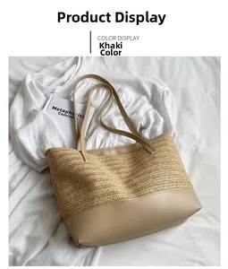 Close-up of straw woven tote bag with khaki faux leather base and shoulder strap details