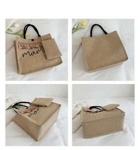 Detailed views of beige linen tote bag with black mama print and colorful fringe trim