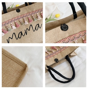 Detail of linen tote bag with mama print, fringe trim, and woven texture close-up
