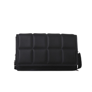 Classic black quilted messenger bag with plaid texture and adjustable shoulder strap