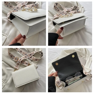 Detailed views of white pleated crossbody bag featuring floral embroidery wide strap