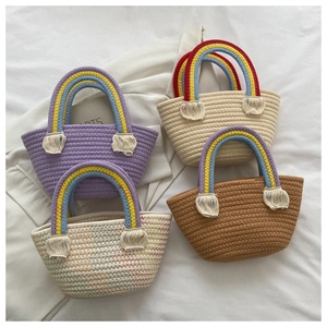 Rainbow handle woven tote bags with tassels and handmade texture for summer beach vacation