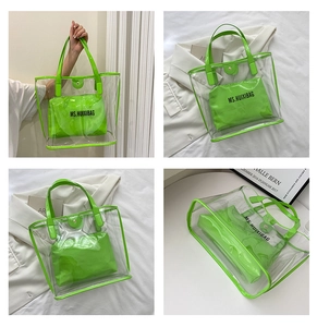 Detail of transparent PVC tote bag with neon green trim and inner zipper pouch