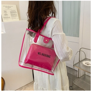 Detailed view showing the transparent jelly tote bag with a stylish pink inner pouch.