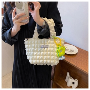 White bubble pleated shoulder bag with floral charm and Fashion Instinct label