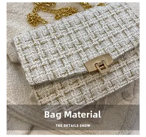 Close-up of white tweed fabric texture and gold buckle detail on crossbody bag