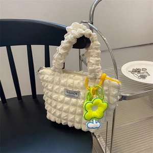 Chic bubble texture shoulder bag in cream white with ruffled handle and flower charm