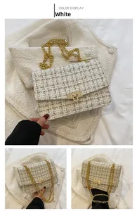 Detail of white tweed crossbody bag with gold chain strap and metallic twist lock clasp