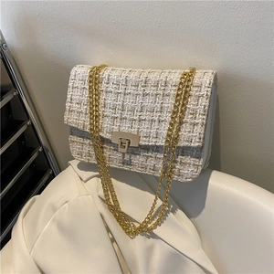 White and beige woven tweed crossbody bag with golden twist lock and chain strap