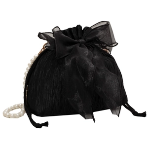 Elegant black pleated bucket bag with large organza bow and pearl chain strap