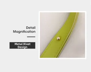 Detail showing polished golden round rivet and precise stitching on green leather strap