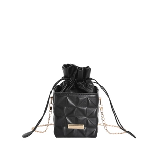 Quilted black drawstring bucket bag with gold chain strap and metallic detail