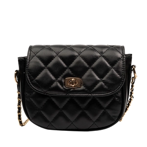 Classic black quilted saddle bag with golden chain strap and metallic rotary lock closure